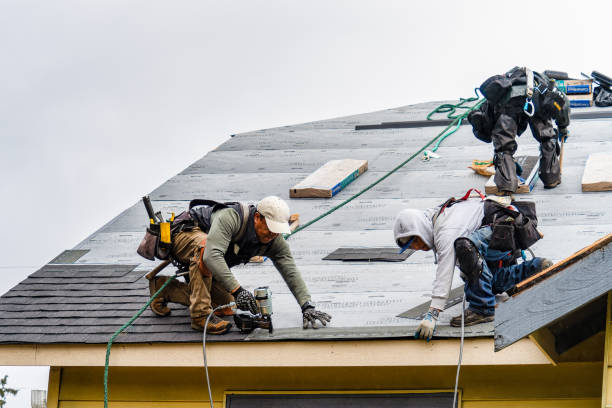 Professional Gutter Installation technician working in Manitou Springs, CO